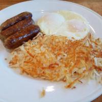 Country Combo · 2 eggs, hash browns, 2 bacon or sausage.