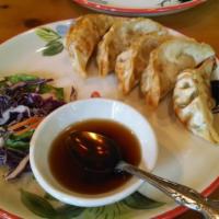 Pot Stickers · Chicken vegetable Japanese potstickers with ginger and sweet black soy sauce.