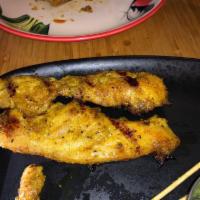 Chicken Satay · This street food favorite features marinated chicken flame grilled on bamboo skewers. Served...
