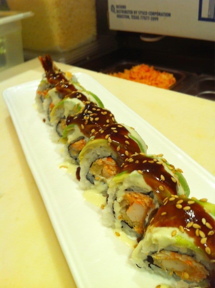 Piano Roll · Shrimp tempura and spicy crabmeat topped with avocado with wasabi and eel sauce.