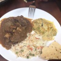 Goat Curry · Lamb meat cooked with fine blend of Indian spices.