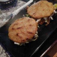 Gorditas · Two stuffed corn dough mixed with carnitas and filled with choice of meat, lettuce, sour cre...