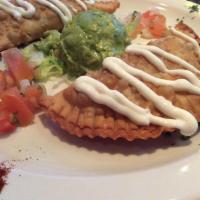 Mini Empanadas · Potato and cheese filled with lettuce, sour cream, tomatoes and fresh cheese. 