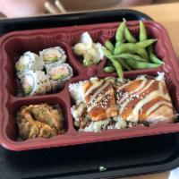 Salmon Teriyaki Bento · With California roll, 2 piece gyoza, salad, miso soup, edamame and rice.