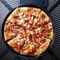 Sriracha Chicken Pizza · Shredded mozzarella, chicken, bacon, jalapeno, and a sriracha swirl. Substitute the meat for...
