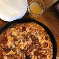 Meat Lovers Pizza · Fresh-made marinara, shredded mozzarella, pepperoni, sausage, Canadian bacon, and bacon. Sub...