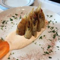 Pacanga Borek · Phyllo rolls stuffed with beef pastrami and mozzarella red peppers.
