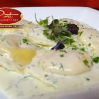 Lobster Ravioli · Served with white wine dill sauce