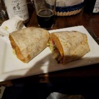 California Burrito · Colossal burrito stuffed with carne asada, fries, Mexican rice, peruano beans, lettuce, pico...