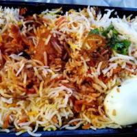 Special Chicken Biryani · Basmati rice cooked with herbs and spices, mixed with boneless chicken and garnished with eg...