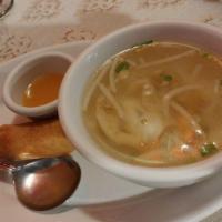 Wonton Soup · Shrimp and chicken wontons, mixed vegetables and fried garlic in clear chicken broth.