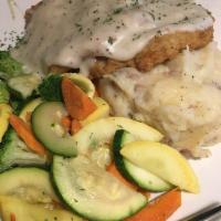 Country Fried Steak · Breaded and fried, red bliss mashed potatoes, seasonal vegetables, and white pepper gravy.