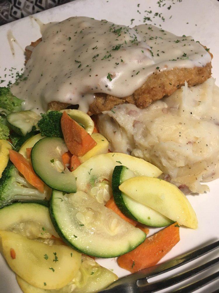 Country Fried Steak · Breaded and fried, red bliss mashed potatoes, seasonal vegetables, and white pepper gravy.