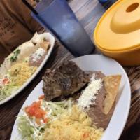 Carne Asada · A thinly sliced and slightly seasoned Skirt Steak fillet with a side of rice, beans, salad a...