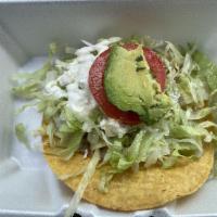 Sopes · 1 thick, fried corn tortilla with beans your choice of meat plus lettuce, crumbled queso fre...