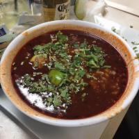 Menudo · Beef tripe soup, with sides of onions, cilantro, lime and hand made tortillas.
