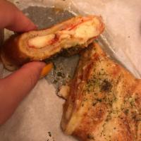Pepperoni Roll · Handcrafted using our fresh baked dough, stuffed with pepperoni, whole milk mozzarella, hous...