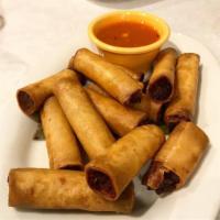 Lumpiang Shanghai No Rice · Mixture of vegetable, ground pork and shrimp served with a sweet and sour dipping sauce.
