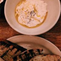 Burrata · served with grilled house made sourdough.