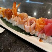 Fashion Show Roll · California roll topped with Ahi Tuna, salmon, yellowtail, albacore, shrimp, smelt egg, spicy...