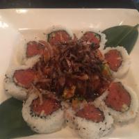 Salsa Dance Roll · Spicy crab topped with salmon, avocado, tomato and smelt egg mixed with Japanese mustard and...