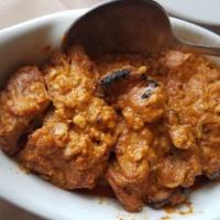 Chicken Tikka Masala · Boneless tandoori chicken pieces cooked in a yogurt, cream and nut sauce.