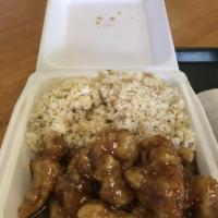 Sesame Chicken · Served with steamed rice. Spicy.