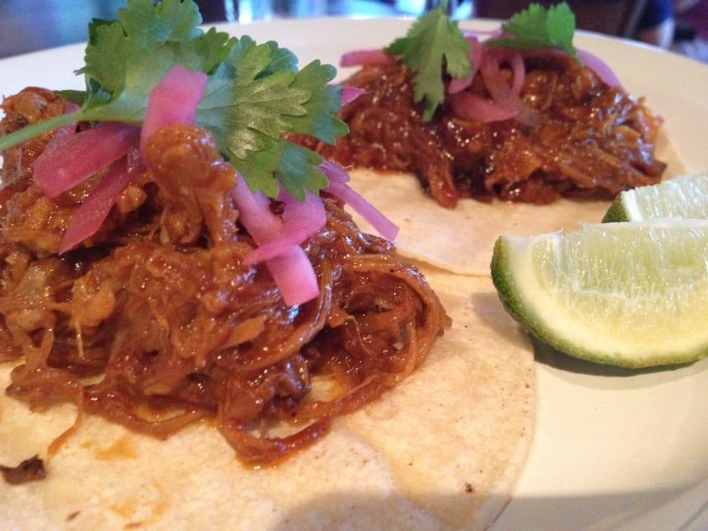 House Smoked Spicy Pulled Pork Tacos · 