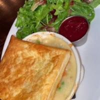 Chicken Pot Pie · White meat chicken, root vegetables, puff pastry, cranberry sauce, and mixed green salad