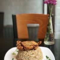 Crab Fried Rice · Fried rice with crab meat throughout and topped off with a soft shell crab.