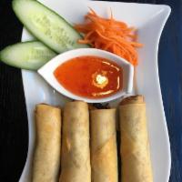 4 Spring Rolls · A mixture of shrimp, pork, carrots, clear vermicelli noodle, and herbs fried to a golden bro...