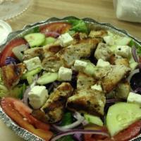 Greek Salad · Iceberg and romaine lettuce, tomato, cucumber, red onion, red cabbage, feta cheese, Kalamata...