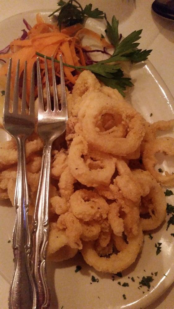 Fried Calamari · Deep-fried calamari served with marinara sauce.