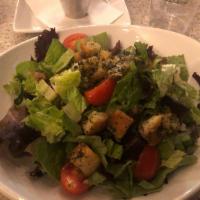 Mixed Green Salad · Organic spring mix, romaine, grape tomatoes and croutons.