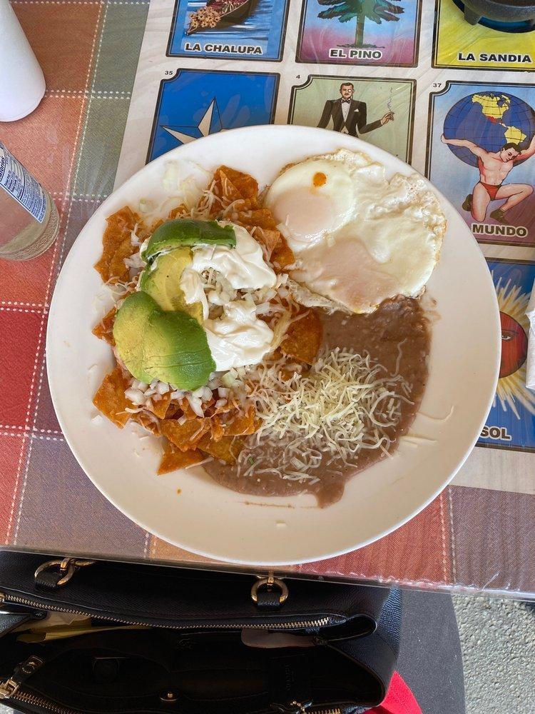 Chilaquiles · Tortillas simmered in a spicy salsa topped with 2 eggs, sour cream and onion. Add carne asada for an additional charge.