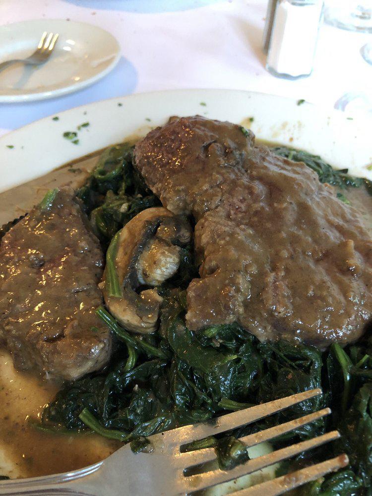 Filet Mignon Savino Dinner · 8 oz. filet mignon sliced in 2, sauteed with fresh mushrooms and Burgundy wine sauce. Served with spinach and roasted potatoes.