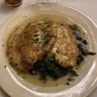 Chicken Francese Dinner · Sauteed with lemon and white wine, served over a bed of spinach.