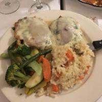Chicken Florentine Dinner · Baked chicken breast with spinach, ricotta, capicola, and mozzarella. Served with risotto an...
