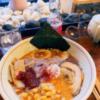 Miso Ramen · Housemade pork broth seasoned with miso, marinated egg, chashu, corn, bamboo shoots, scallio...