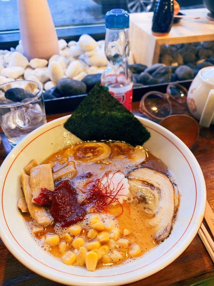 Miso Ramen · Housemade pork broth seasoned with miso, marinated egg, chashu, corn, bamboo shoots, scallions, nori, and narutomaki.