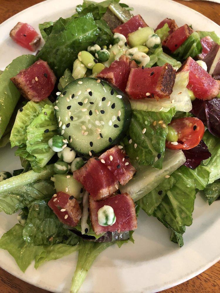 Seared Ahi Tuna Salad · Mixed greens, wasabi, peas, edamame, cucumber, cherry tomatoes and ginger vinaigrette.