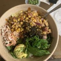 Poke Bowl · A Hawaiian fish salad. Fresh sushi grade salmon and tuna mixed with pineapples, roasted corn...