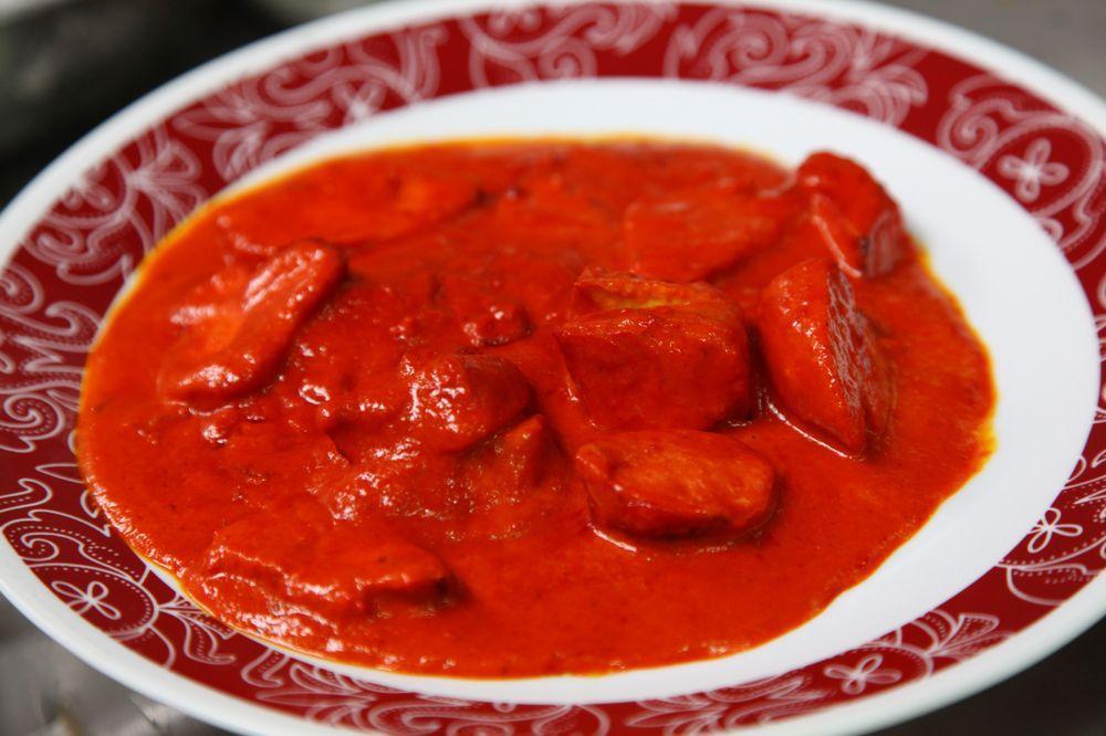 Chicken Tikka Masala · Chicken cubes cooked with special tandoori mild spicy sauce light creamy sauce.Served with basmati rice or naan bread.