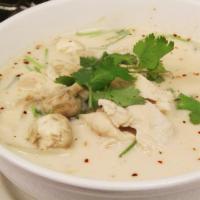 Tom Kah · Coconut soup with mushrooms, lemongrass, lime leaf, galanga and coconut milk, seasoned with ...
