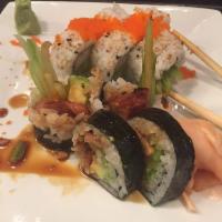 California Roll · Imitation crab, avocado, and cucumber inside with smelt eggs on top.