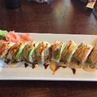 Happy Roll · Shrimp tempura and crab, cucumber inside with 3 shrimp, avocado, spicy mayo, cream sauce, an...