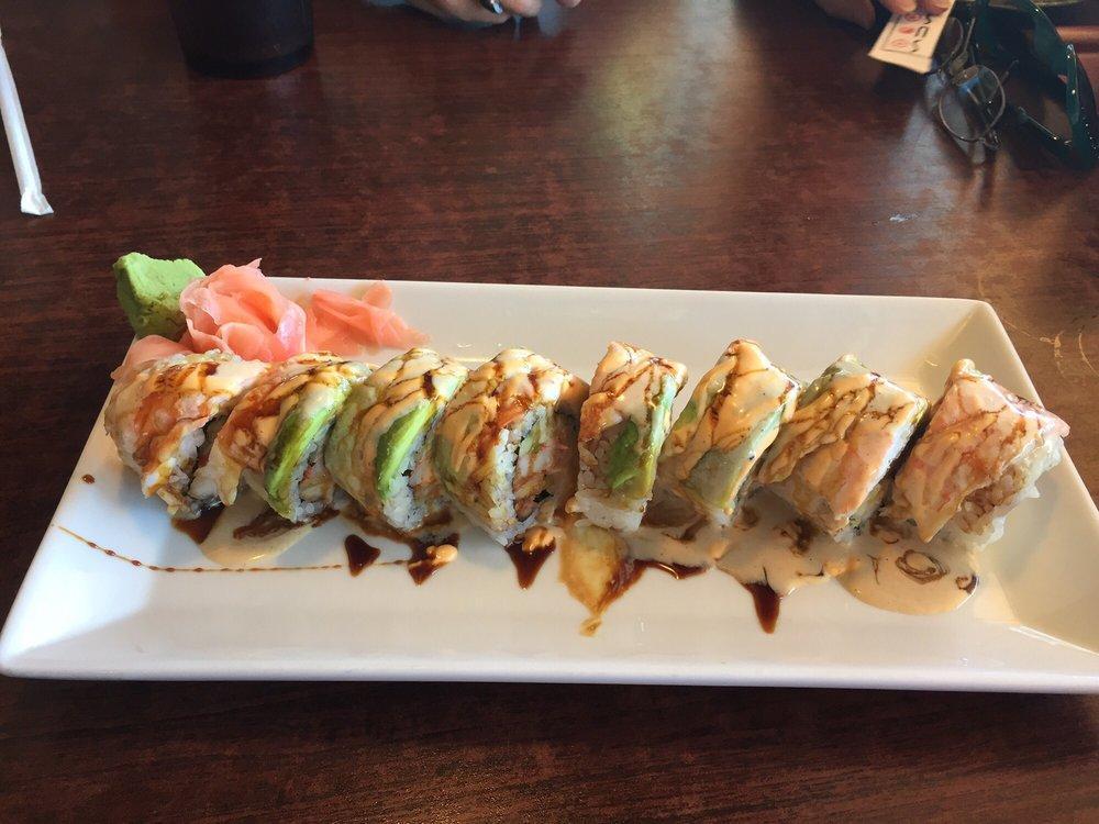 Happy Roll · Shrimp tempura and crab, cucumber inside with 3 shrimp, avocado, spicy mayo, cream sauce, and eel
Sauce on top.