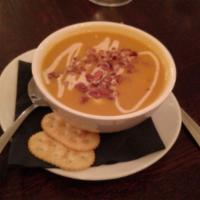 Butternut Squash Soup · with spiced cream sauce