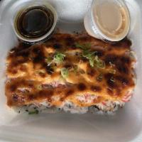 Volcano Roll · Salmon, Krab, And cream cheese. Topped with baked seafood