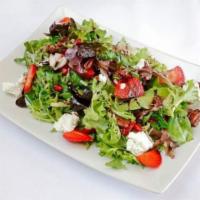 Strawberry Fields Sally · Mixed greens, fresh strawberries, pomegranate seeds, crumbled goat cheese, candied pecans an...